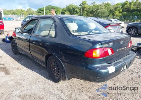 1999 Toyota Corolla Le z USA, uszkodzony, nr VIN 1NXBR12E5XZ201923